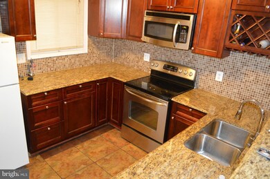 9302 Sparrow Valley Dr, Montgomery Village, MD 20886 - photo 4