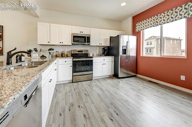 **Photos of previous model home of same floor plan