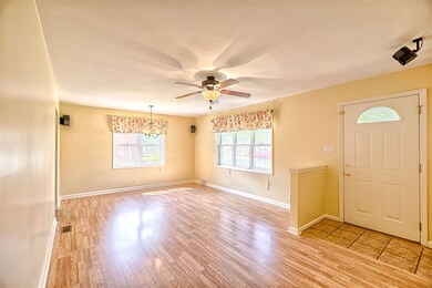 Nice large picture window and front entry has half