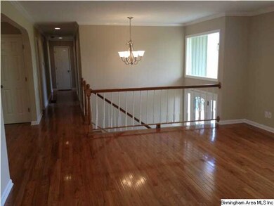 LARGE LIVING ROOM WITH BEAUTIFUL HARDWOOD FLOOR AN