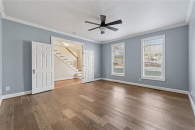 Unfurnished bedroom with visible vents, ornamental