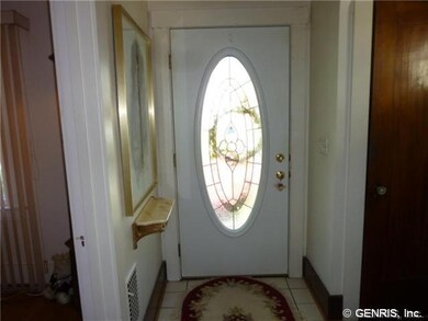 Foyer Features ceramic floor and guest closet!