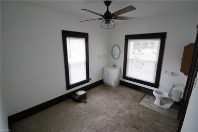First floor half bath being used as a bedroom