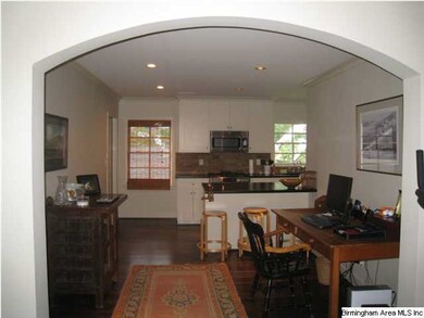 Arched Entrance to Dining Room and Kitchen