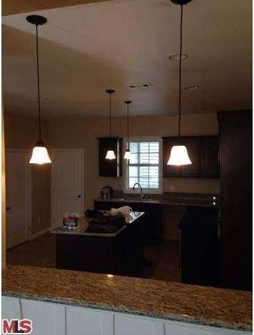 Stylish new Granite countertops and cozy cabinets