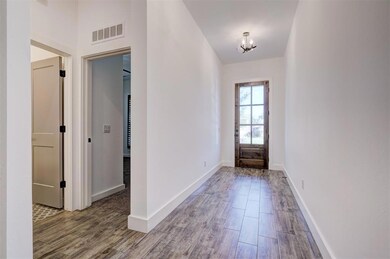 Foyer featuring hardwood / wood-style floors