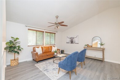 Living room with lofted ceiling, new LVP flooring