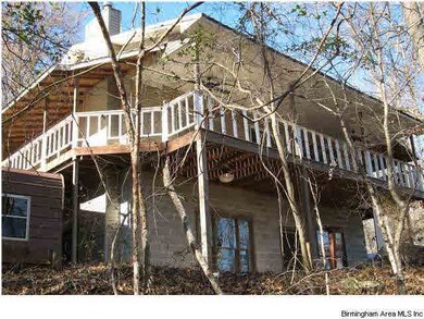 Wrap around porch with patio at ground level