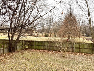 View from back patio looking at walking trail