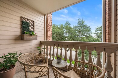 The private balcony offers refreshing treetop view
