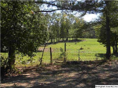The left side of the home is pasture land.
