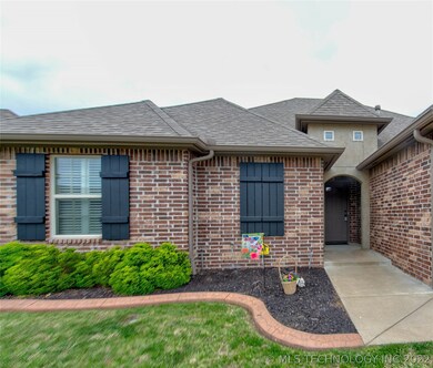 Professionally landscaped with Stone-lined Bed and