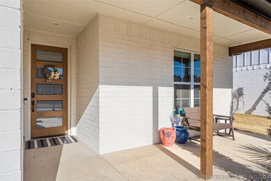 Relax on this beautiful covered porch with views o