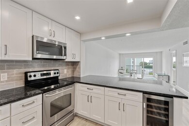 Windward Towers unit 411, Clearwater Beach, FL 33767 - photo 2