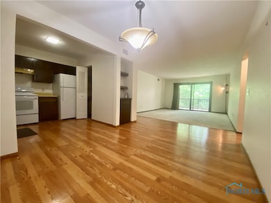 Living room with door to the Balcony