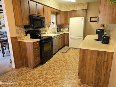 Galley Kitchen; cabinets on both sides