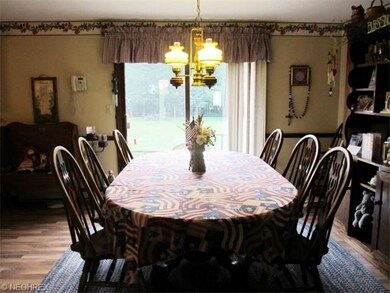 Spacious dinette with sliders to the back yard and