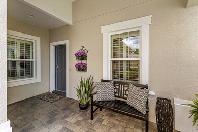 Inviting Front Porch with brick Pavers