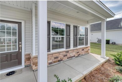 View of patio with central AC unit