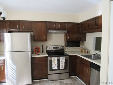 Stainless steel appliances, refinished cabinets, n