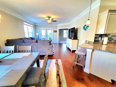 Dining space featuring ornamental molding, french 