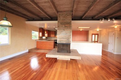 Beautifully refinished wood floors in Living Room/Dining Room combo.