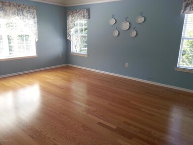 MASTER BEDROOM WITH HARDWOOD FLOORS
