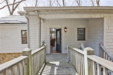 Welcome to 193 Valley View Trail.  This home has a one car garage as well as a parking pad.  This ramp leads from the parking pad into the home.