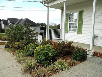 Lovely flowers & perennials grace this home.