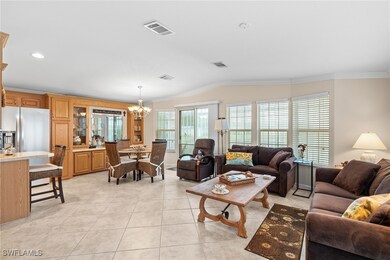 Living room featuring light tile patterned floors,