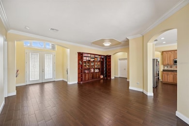 Grand foyer entrance with formal living & dining rooms.