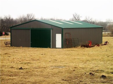 30x50 metal outbuilding has skylights built in for
