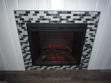 Dimplex electric fireplace adds to the cottage fee
