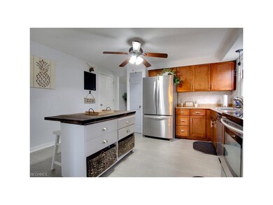 Island with butcher's block top included in the ho