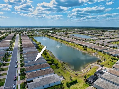 Bird's eye view with a water view and a residentia