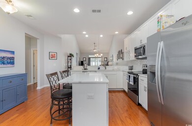Kitchen with appliances with stainless steel finis