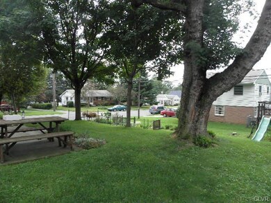 patio area. large shade tree makes this so comfort