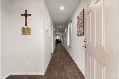 This entry way showcases the pathway to the heart of this home.