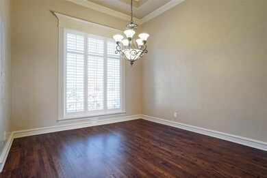Dining room with cased window frame, custom basebo