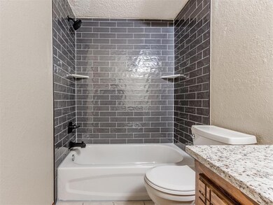 Full bathroom with bathing tub / shower combinatio