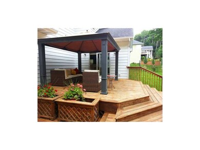 Deck. Access from the kitchen. Deck has stairs to 