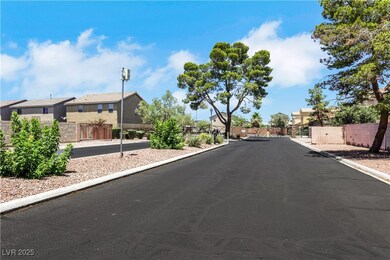View of asphalt street with a residential view, cu