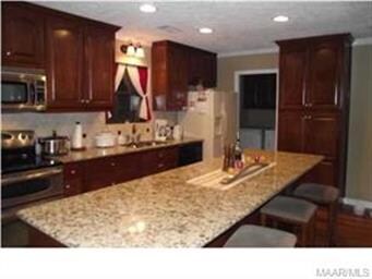 Kitchen with View of Work Island