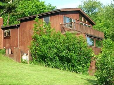 Exterior Front. Side lot view