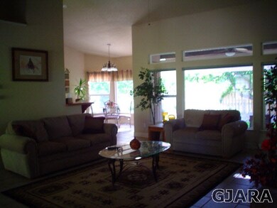 Beautiful Living Room looks out on a private backy