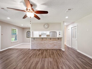 Tasteful brick accent on breakfast bar