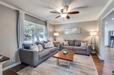 Comfortable living area with open flow to the kitchen and dining space
