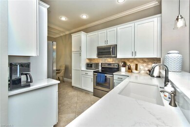White shaker cabinets, soft close drawers, quartz 