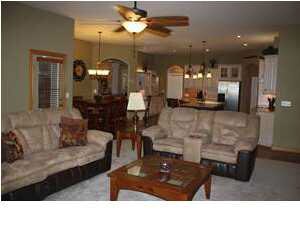 Living room with built-ins and fireplace.
