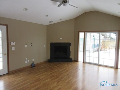 FAMILY ROOM WITH FIREPLACE, CATHEDRAL CEILING AND